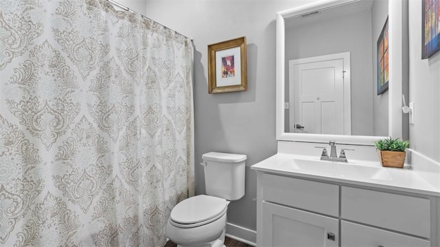 155 Bucktail Dr, Cranberry Twp, PA 16066 - bathroom with vanity, toilet, baseboards, and a shower with curtain