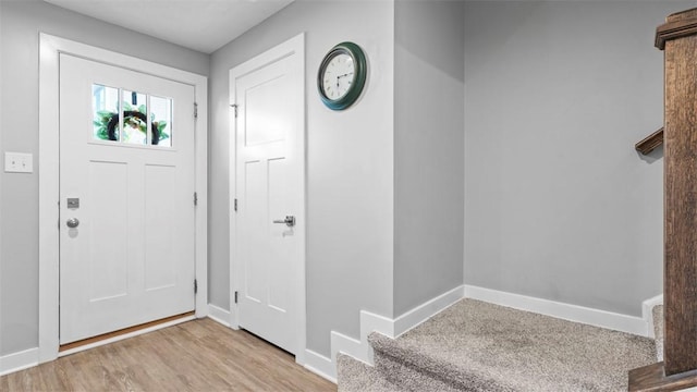 155 Bucktail Dr, Cranberry Twp, PA 16066 - entryway with baseboards and wood finished floors
