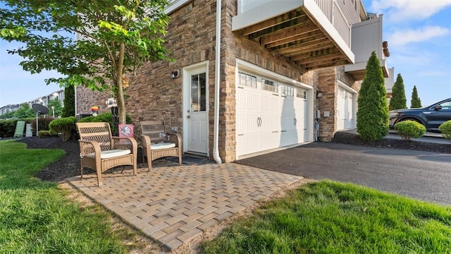 155 Bucktail Dr, Cranberry Twp, PA 16066 - entrance to property featuring stone siding, driveway, and an attached garage
