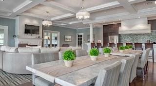 155 Bucktail Dr, Cranberry Twp, PA 16066 - dining room with coffered ceiling, wood finished floors, a chandelier, and beamed ceiling