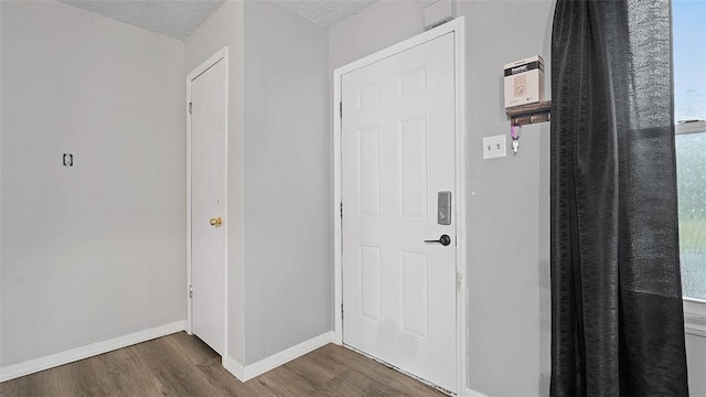 40 Meanor St, Findlay Twp, PA 15126 - corridor featuring wood finished floors, baseboards, and a textured ceiling