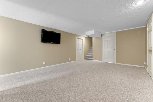 221 Moody Rd, Imperial, PA 15126 - finished basement with a textured ceiling, baseboards, carpet floors, and stairs