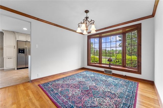 221 Moody Rd, Imperial, PA 15126 - spare room featuring ornamental molding, a chandelier, baseboards, and light wood-style flooring