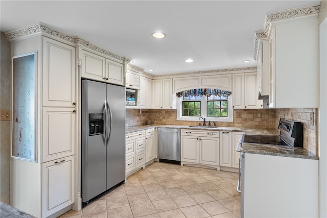 221 Moody Rd, Imperial, PA 15126 - kitchen featuring appliances with stainless steel finishes, a sink, decorative backsplash, recessed lighting, and dark stone countertops