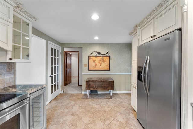 221 Moody Rd, Imperial, PA 15126 - kitchen with appliances with stainless steel finishes, recessed lighting, glass insert cabinets, french doors, and baseboards