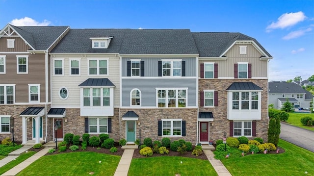 4046 Overview Dr, Cecil, PA 15317 - multi unit property with stone siding, board and batten siding, a front yard, and a shingled roof