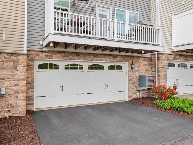 4046 Overview Dr, Cecil, PA 15317 - garage featuring cooling unit and driveway