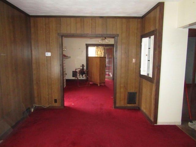 2445 Brownsville Rd, Carrick, PA 15210 - corridor with carpet, wooden walls, and baseboards