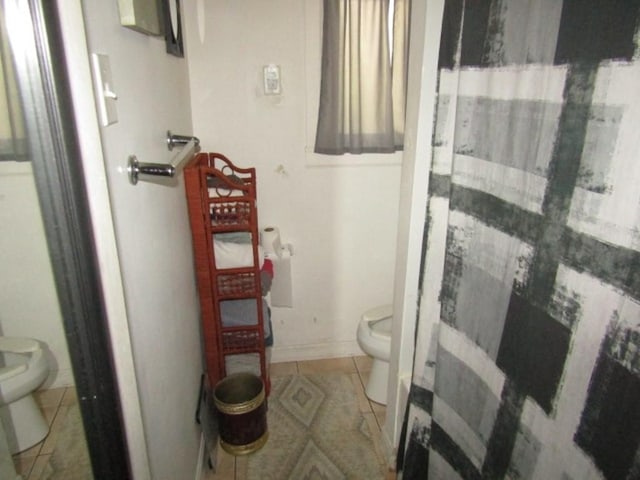 2445 Brownsville Rd, Carrick, PA 15210 - bathroom featuring toilet and tile patterned floors