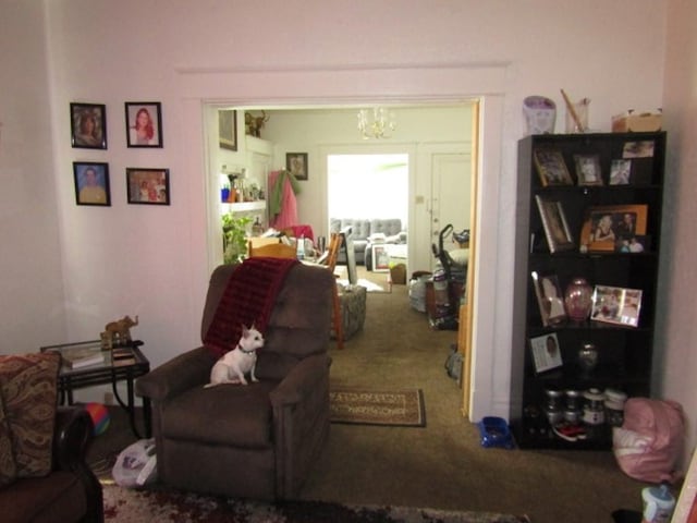 2445 Brownsville Rd, Carrick, PA 15210 - carpeted living area featuring a chandelier