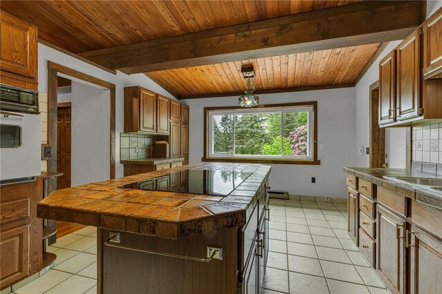 1369 Old Pulaski Rd, Neshannock Twp, PA 16105 - kitchen with tile countertops, white oven, light tile patterned floors, and wooden ceiling