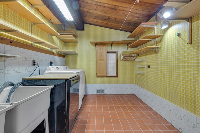 1369 Old Pulaski Rd, Neshannock Twp, PA 16105 - washroom featuring tile patterned floors, washing machine and clothes dryer, wooden ceiling, and wallpapered walls