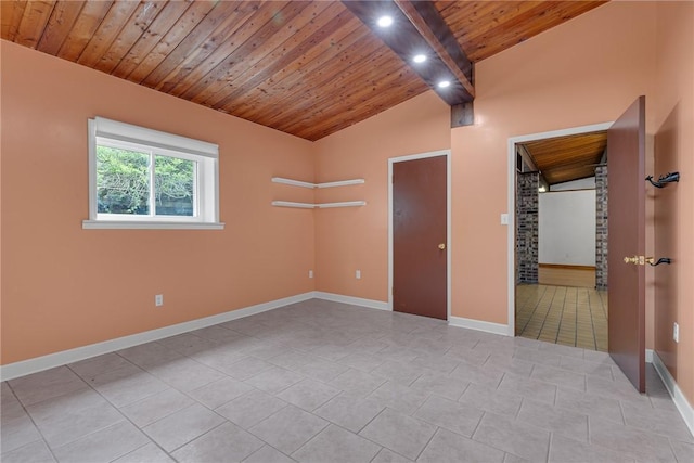 1369 Old Pulaski Rd, Neshannock Twp, PA 16105 - unfurnished bedroom with vaulted ceiling, wood ceiling, baseboards, and light tile patterned flooring