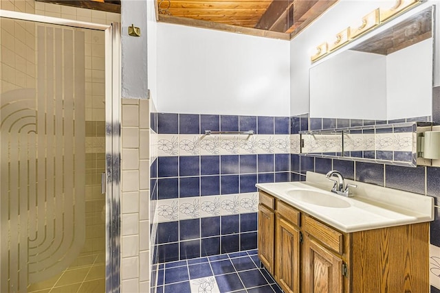 1369 Old Pulaski Rd, Neshannock Twp, PA 16105 - bathroom with vanity, tile walls, a shower stall, tile patterned floors, and a wainscoted wall