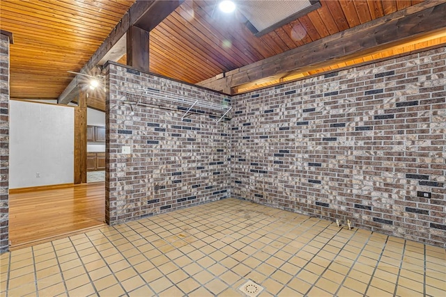 1369 Old Pulaski Rd, Neshannock Twp, PA 16105 - tiled empty room with wood ceiling and brick wall