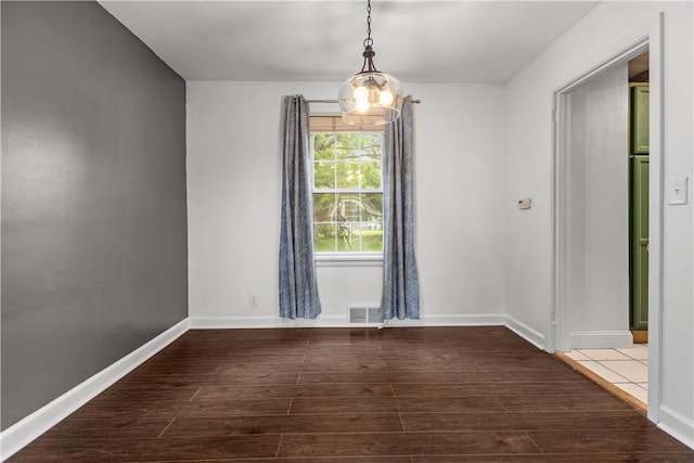 512 Pine Ave, Ellwood City Law, PA 16117 - spare room featuring dark wood finished floors and baseboards