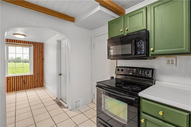512 Pine Ave, Ellwood City Law, PA 16117 - kitchen featuring green cabinetry, black appliances, arched walkways, beam ceiling, and light countertops