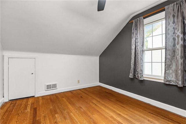 512 Pine Ave, Ellwood City Law, PA 16117 - bonus room with lofted ceiling, hardwood / wood-style floors, ceiling fan, and baseboards