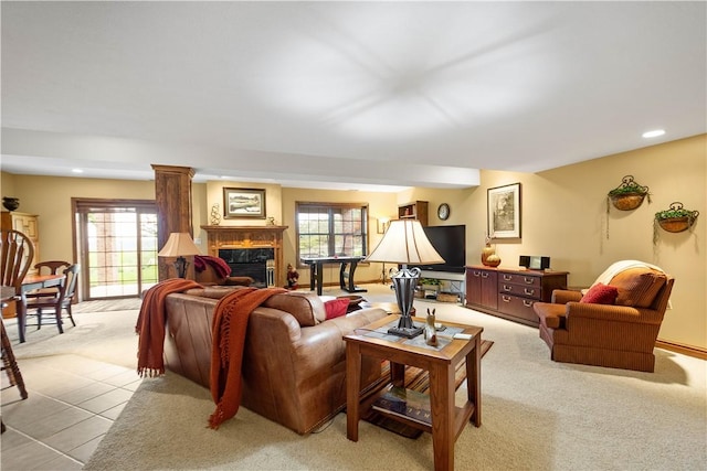409 Foxwood Ln, Scott Twp Sal, PA 15220 - living area with plenty of natural light, a high end fireplace, light carpet, and recessed lighting