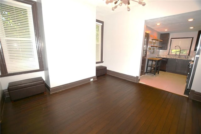 3640 Massachusetts Ave, Brighton Heights, PA 15212 - unfurnished living room with baseboards, hardwood / wood-style flooring, a chandelier, and recessed lighting