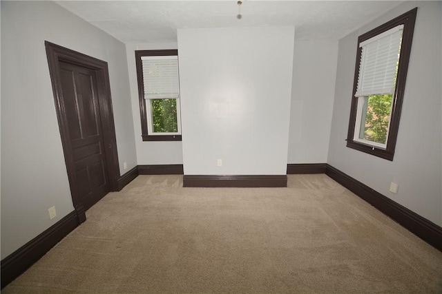 3640 Massachusetts Ave, Brighton Heights, PA 15212 - spare room featuring light colored carpet, plenty of natural light, and baseboards