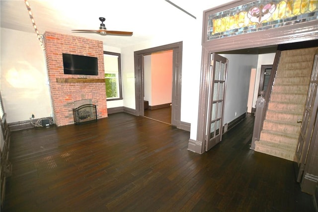 3640 Massachusetts Ave, Brighton Heights, PA 15212 - unfurnished living room with ceiling fan, hardwood / wood-style floors, a brick fireplace, and baseboards