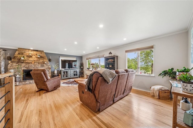 124 Hilton Rd, Unity Twp, PA 15601 - living room featuring ornamental molding, plenty of natural light, light wood-style floors, recessed lighting, and a fireplace