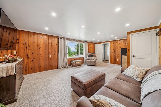 124 Hilton Rd, Unity Twp, PA 15601 - living area with light colored carpet, wooden walls, and recessed lighting