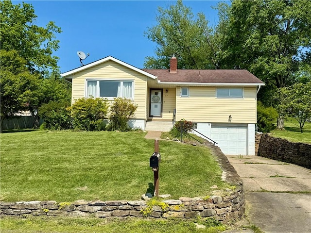 217 Crescent Dr, Hempfield Twp Wml, PA 15601 - ranch-style house with driveway, an attached garage, a chimney, and a front yard