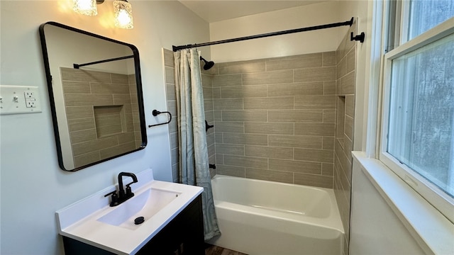 14 Haywood St, Carroll Twp, PA 15063 - bathroom featuring vanity, shower / bathtub combination with curtain, and plenty of natural light