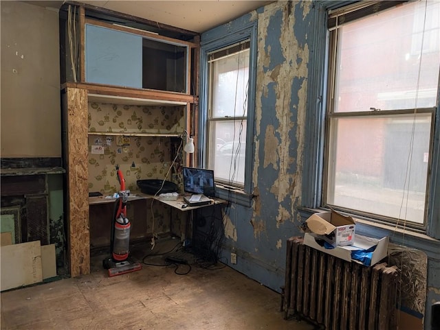 1321-1323 Bingham St, South Side, PA 15203 - home office with radiator heating unit and wallpapered walls