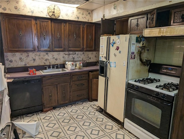 1321-1323 Bingham St, South Side, PA 15203 - kitchen with range with gas stovetop, black dishwasher, wallpapered walls, a sink, and dark brown cabinetry