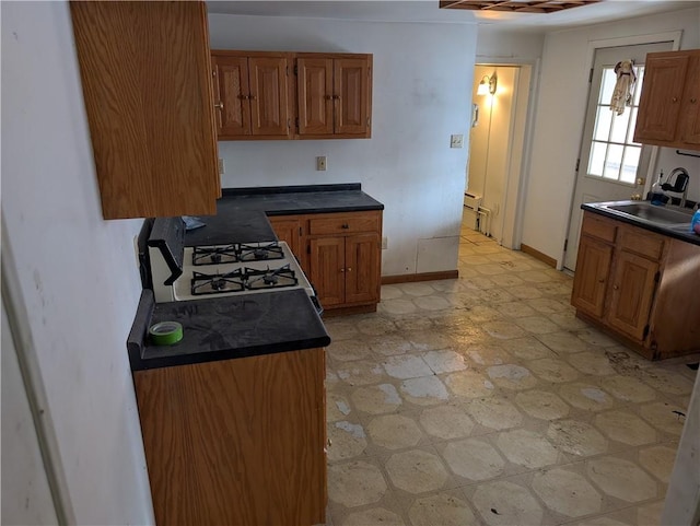 1321-1323 Bingham St, South Side, PA 15203 - kitchen featuring a sink, dark countertops, and gas range oven