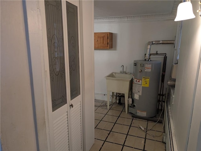 1321-1323 Bingham St, South Side, PA 15203 - utility room featuring gas water heater and a sink