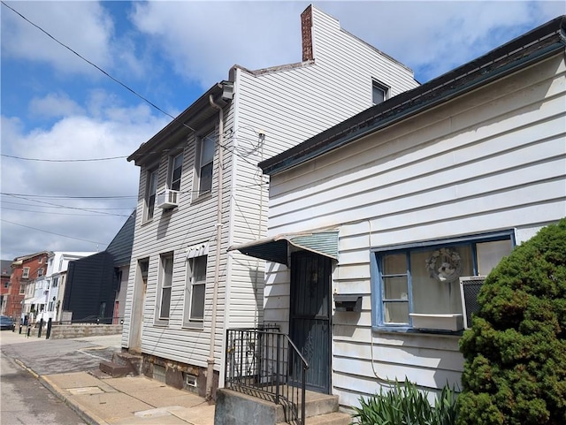 1321-1323 Bingham St, South Side, PA 15203 - view of home's exterior featuring cooling unit
