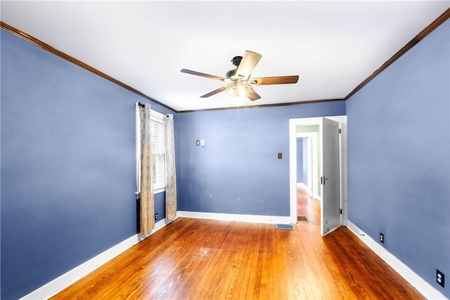 8 Robertson Pl, Etna, PA 15223 - empty room featuring crown molding, wood finished floors, ceiling fan, and baseboards
