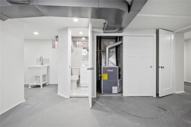 362 Marshall Ave, Observatory Hill, PA 15214 - finished basement with baseboards, heating unit, recessed lighting, and a sink