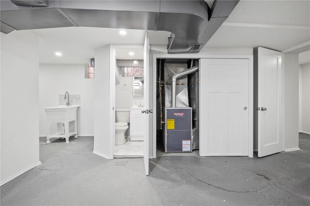 362 Marshall Ave, Observatory Hill, PA 15214 - finished basement with baseboards, heating unit, recessed lighting, and a sink
