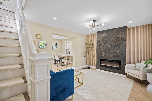362 Marshall Ave, Observatory Hill, PA 15214 - living room with light wood-style flooring, a high end fireplace, a chandelier, recessed lighting, and stairway