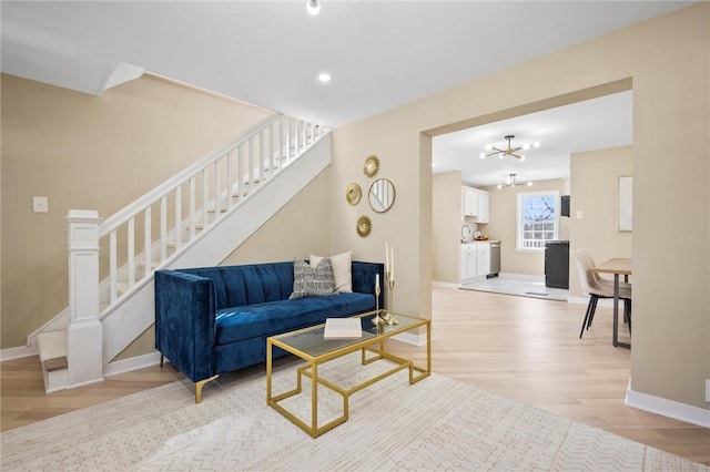 362 Marshall Ave, Observatory Hill, PA 15214 - living room with stairway, light wood-style flooring, baseboards, a chandelier, and recessed lighting