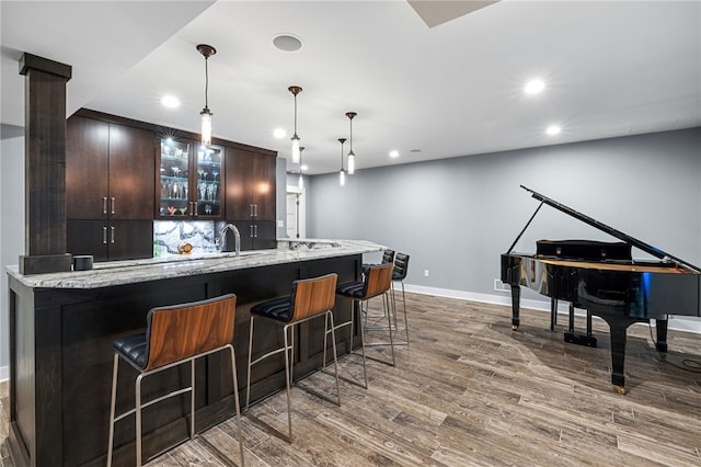 1575 Parkview Blvd, Squirrel Hill, PA 15217 - indoor wet bar featuring dark wood-style floors, recessed lighting, baseboards, and decorative light fixtures