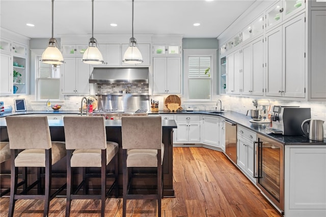 1575 Parkview Blvd, Squirrel Hill, PA 15217 - kitchen with wine cooler, a sink, ventilation hood, dishwasher, and tasteful backsplash