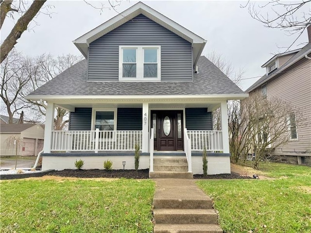 407 E Hillcrest Ave, New Castle/2Nd, PA 16105 - bungalow-style home featuring roof with shingles, a porch, and a front lawn
