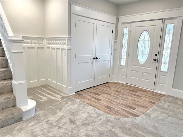 407 E Hillcrest Ave, New Castle/2Nd, PA 16105 - carpeted entryway featuring stairs and wood finished floors