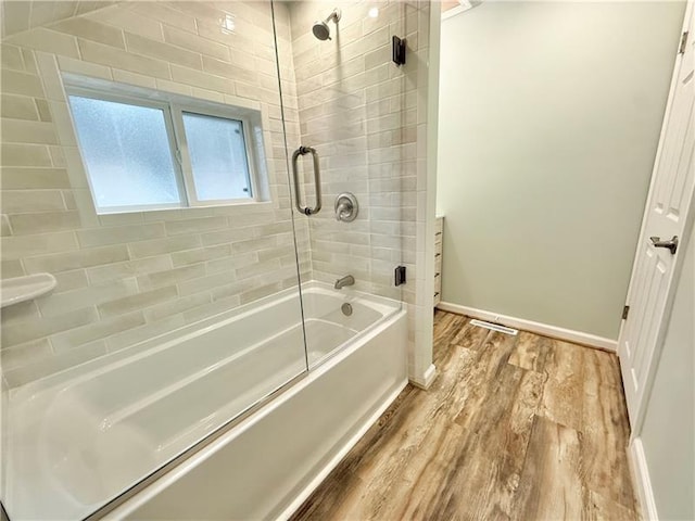 407 E Hillcrest Ave, New Castle/2Nd, PA 16105 - full bathroom with wood finished floors, bath / shower combo with glass door, and baseboards