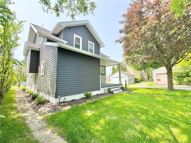 407 E Hillcrest Ave, New Castle/2Nd, PA 16105 - view of home's exterior with a yard and a garage