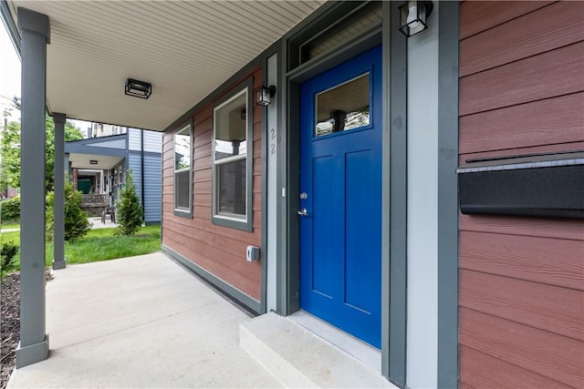 22 Mayflower St, Lincoln-Larimer, PA 15206 - doorway to property with a porch