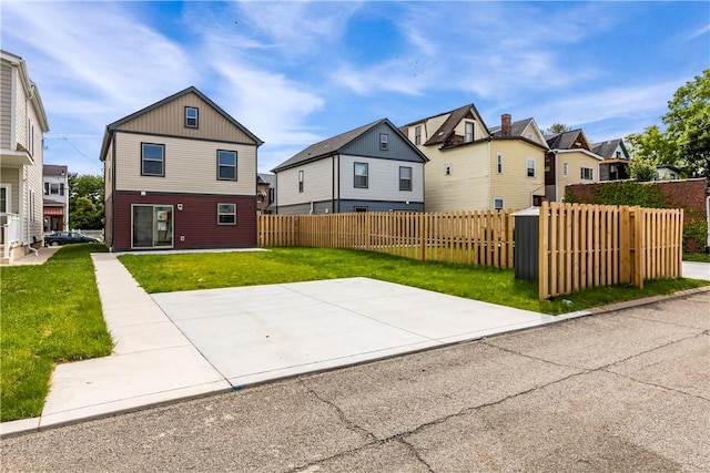 22 Mayflower St, Lincoln-Larimer, PA 15206 - rear view of house featuring a residential view