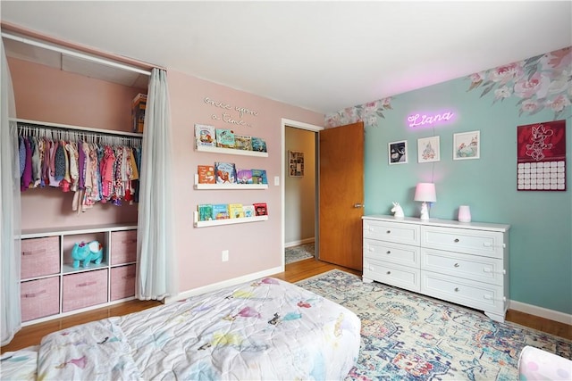 105 Canaveral Dr, Penn Hills, PA 15235 - bedroom featuring a closet, wood finished floors, and baseboards