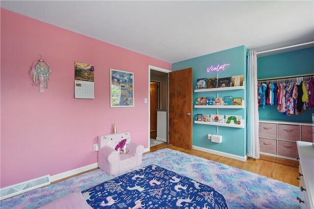 105 Canaveral Dr, Penn Hills, PA 15235 - bedroom with wood finished floors, a closet, and baseboards